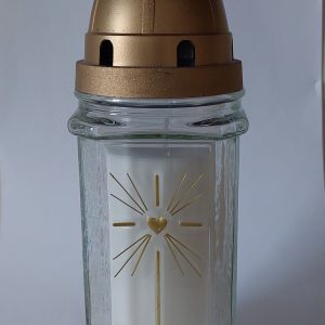 Sveces stiklā ar zelta krustu